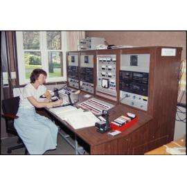 Elizabeth Purdie at Eihudie switchboard in audioconference control room