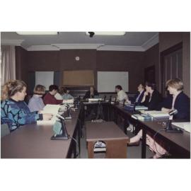 People using the University Extension conference room, 'Salmon (Jack) U.E. Teleconference Equipment'