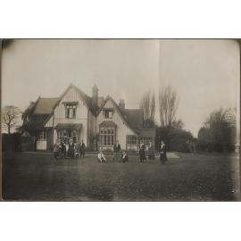 Staff and students on the lawn in front of Te Wai Pounamu College
