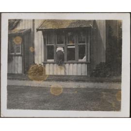 'The Head Pre...', showing girl climbing in window at Te Wai Pounamu College