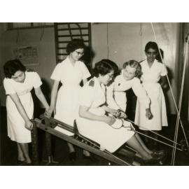 Colombo Plan students, rowing machine