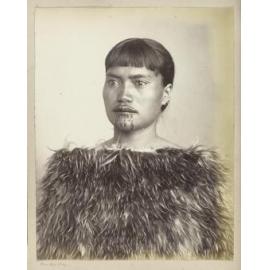 Unidentified young woman in a kahu kiwi, Hawke's Bay