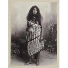 Untitled portrait of young Māori woman wearing a cloak