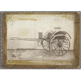 Two-wheeled horse-drawn round top dog cart