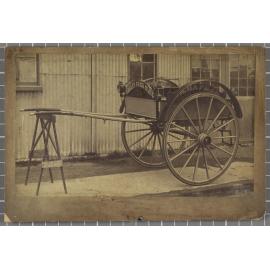 Two-wheeled horse-drawn dog cart