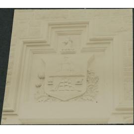 City crest over High School door