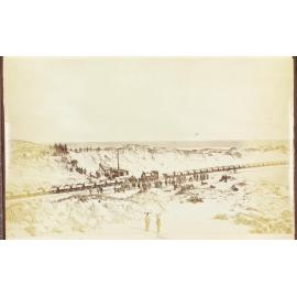 Loading sand for Dunedin reclamation
