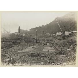 Elevated site view showing work of laying concrete bed
