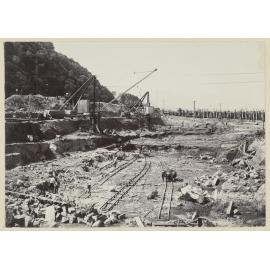 Rail wagons, cranes and excavations