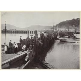 Group of adults and children at the wharf