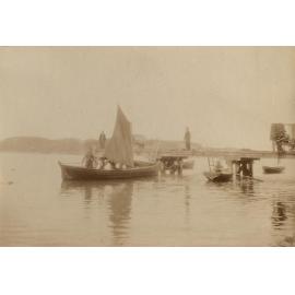 Sail boat at a jetty