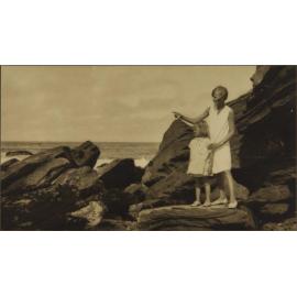 Lorna Chance with her sister Gwenda on a rock at the beach