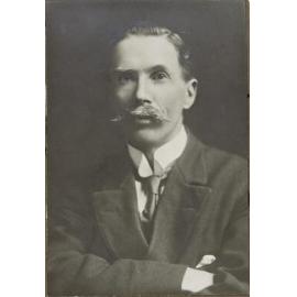 T.K. Sidey B.A. LL.B M.P.