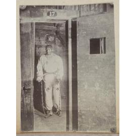 Model of prisoner in shackles