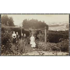 Unidentified family in garden