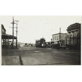 Two buses and a tram at Hall Corner, Auckland