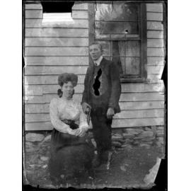Couple in front of Hawea Hotel