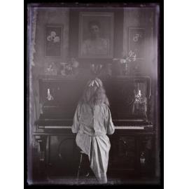 Marion Scott playing the piano