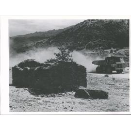 early stages of Clyde Dam project. South side of river 1/2 way between Clyde & Cromwell perhaps opp. Leaning Rock Creek.