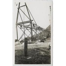 Two men up on the mast