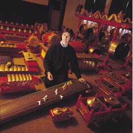 Henry Johnson with gamelan instruments