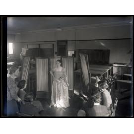 Class with a model wearing a dress, School of Home Science