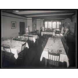 Dining room with place settings, Studholme Hall, School of Home Science