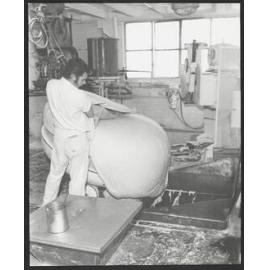Man pouring dough at Laurenson's Bakery