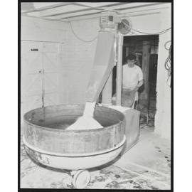 Flour being poured into mixer at Laurenson's Bakery