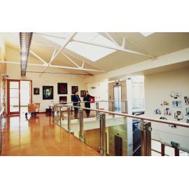 Hocken Library mezzanine, Mary Lewis on right