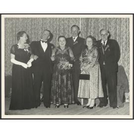 Mabel Howard and five others dressed for a formal occasion