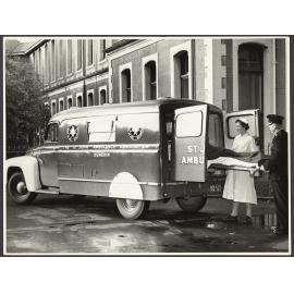 Ambulance at Dunedin Hospital, with staff and patient