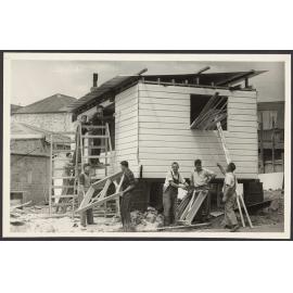 'Members of the St John Ambulance Brigade working on construction of a First Aid Post for Wanaka'