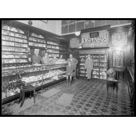 Chemist shop interior with staff