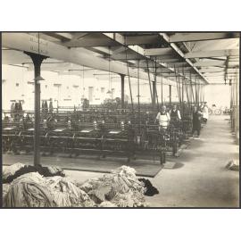 Workers with frame knitting machines