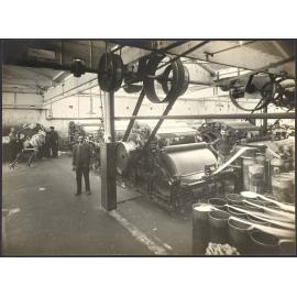 Workers with larger carding machines, making sliver or roving prior to spinning the wool