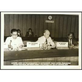 Dr G. Bustamante, Dr John Borrie, unidentified man