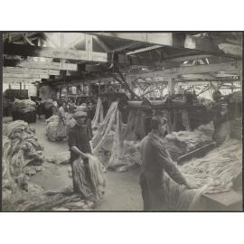 Workers handling fibre inside Donaghy's factory