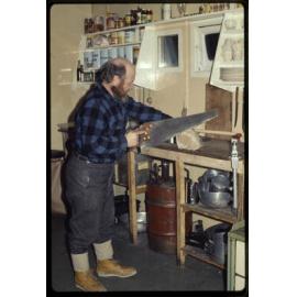 Lowe sawing frozen meat