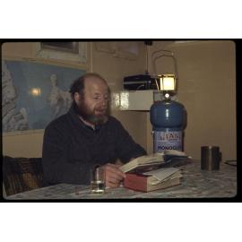 Lowe reading by gaslight