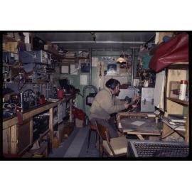 Gary Lewis at radio in laboratory 