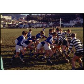 Boys playing rugby at Logan Park
