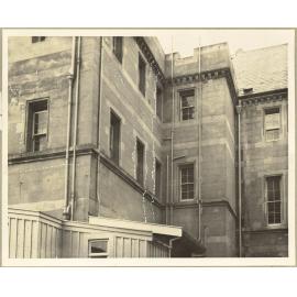 South Wing. Cracks extend from Foundation to Eaves. [Seacliff Hospital]