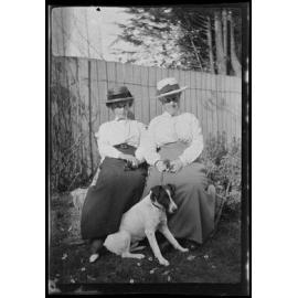 Two women and a dog
