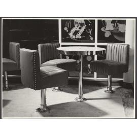 Table and chairs in unidentified bar