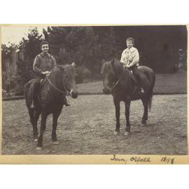 Two boys on horses