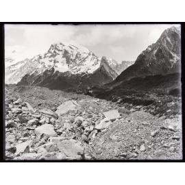Moraine with snowy peak behind, (east of the Divide?)