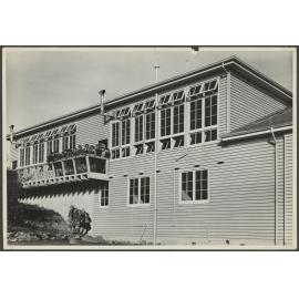 Group of children in front of Wakari School classrooms 
