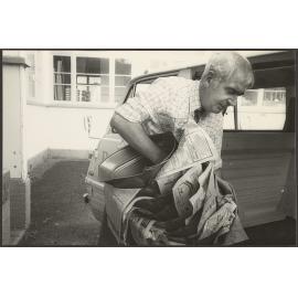 Loading van with metal buckets