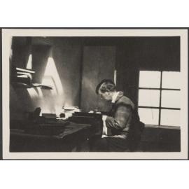 Man [C. Roberts?] at a desk